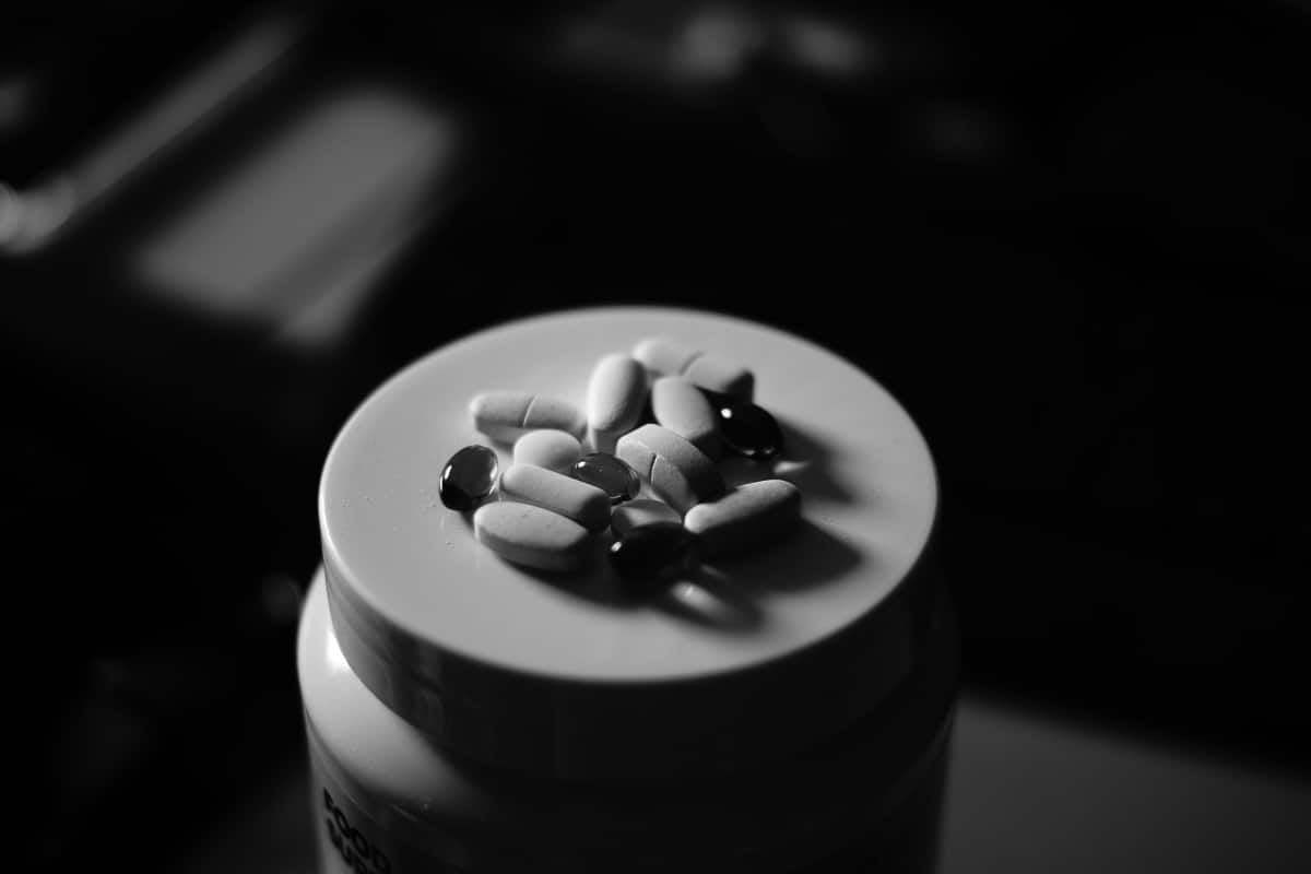 black and white image of pills.