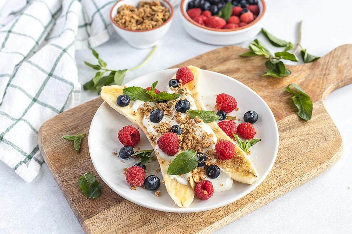 healthy_breakfast_banana_split_with_berries_bella_bucchiotti_5.