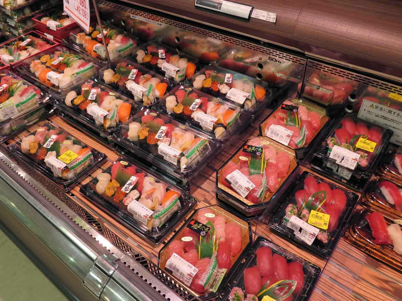 sushi in supermarket case.