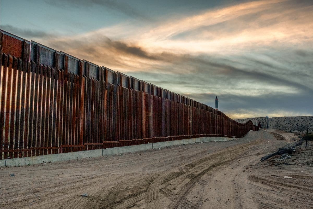 Border Wall Photo Credit_ grandriver from Getty Images Signature via Canva