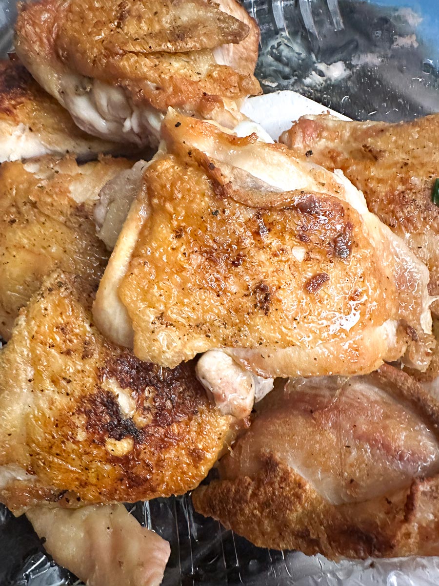 browned chicken in a pile.
