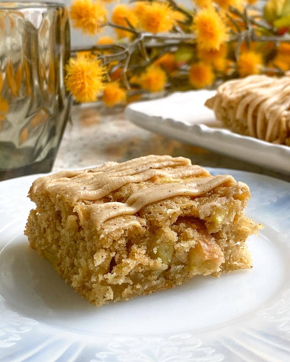 close up side image of Low FODMAP Browned Butter Apple Bars with Cinnamon Maple Frosting.