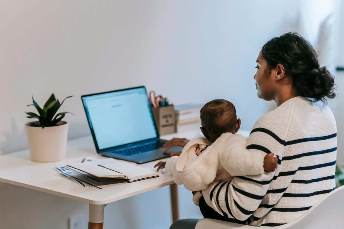 woman and baby using computer.