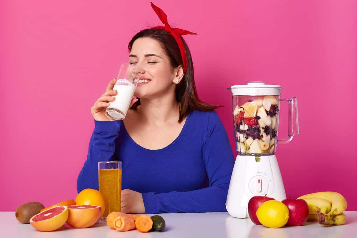 woman drinking smoothie.