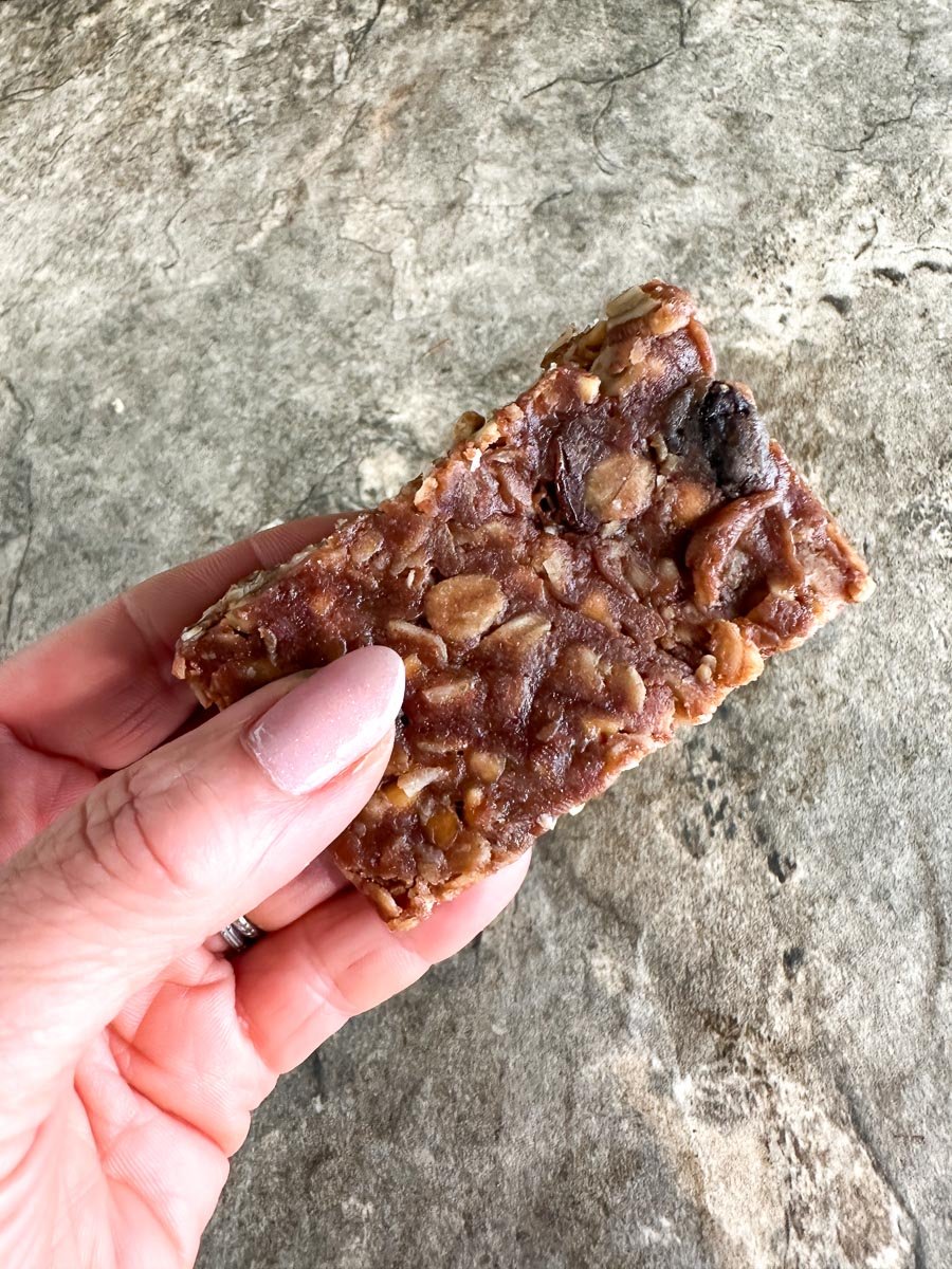 Low FODMAP Snack Bars held in hand.