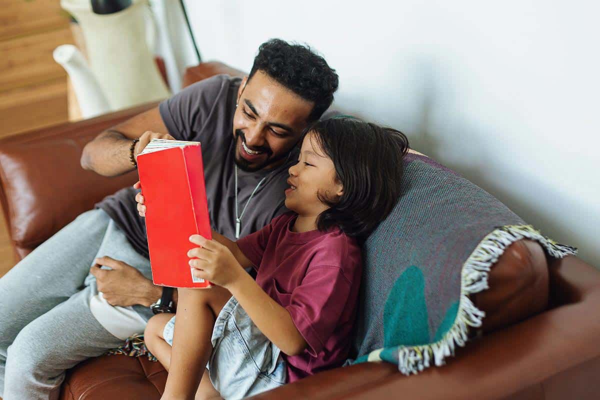 father reading to child.