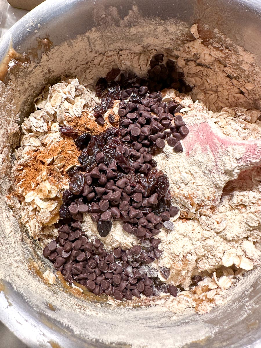 wet and dry ingredients combined in bowl for Low FODMAP Snack Bars.