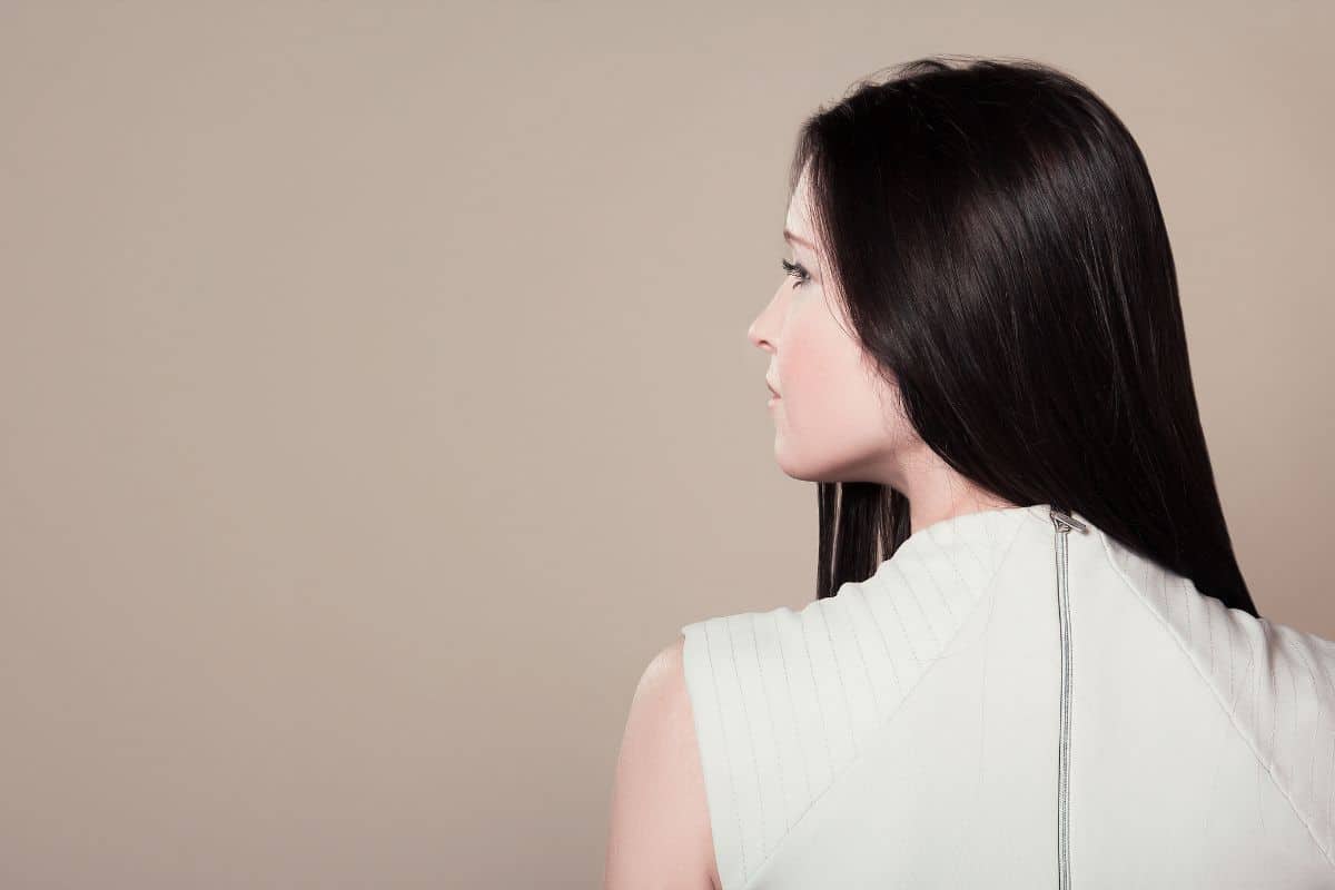 Brunette woman's back. 