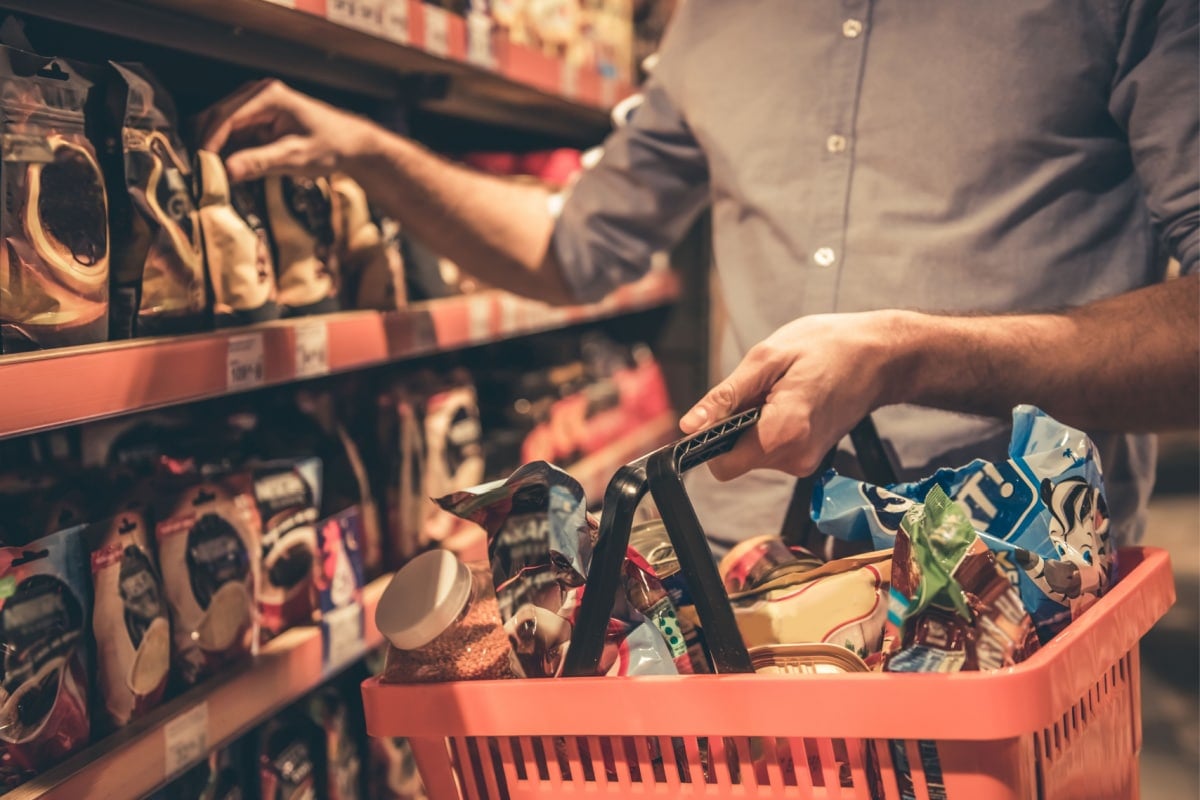 Man grocery shopping