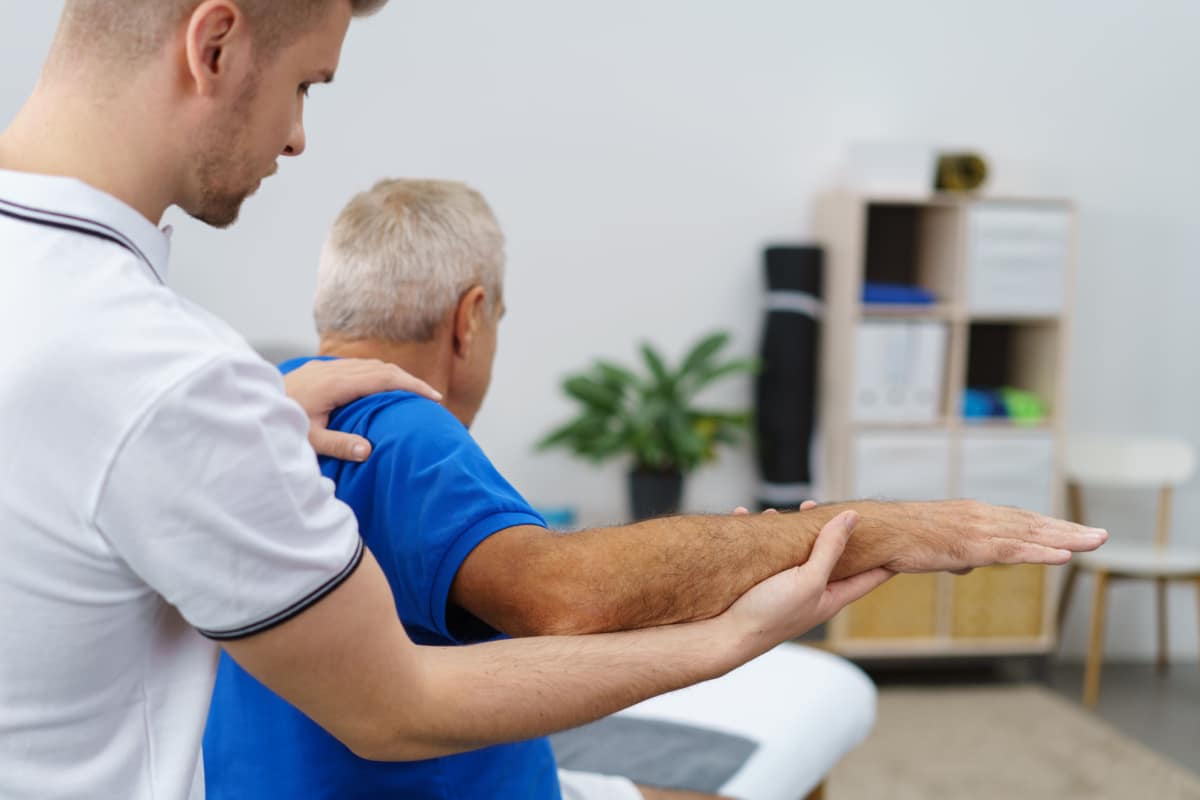 Pphysical therapy with old man