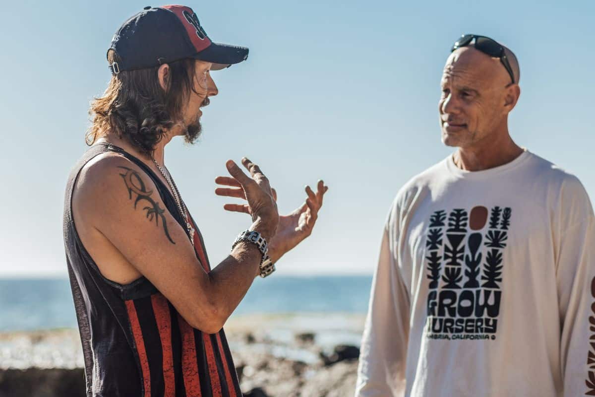 Two men talking. 