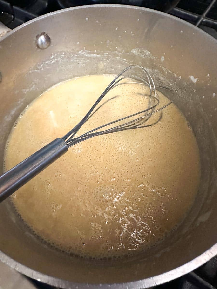 browned roux in pot.