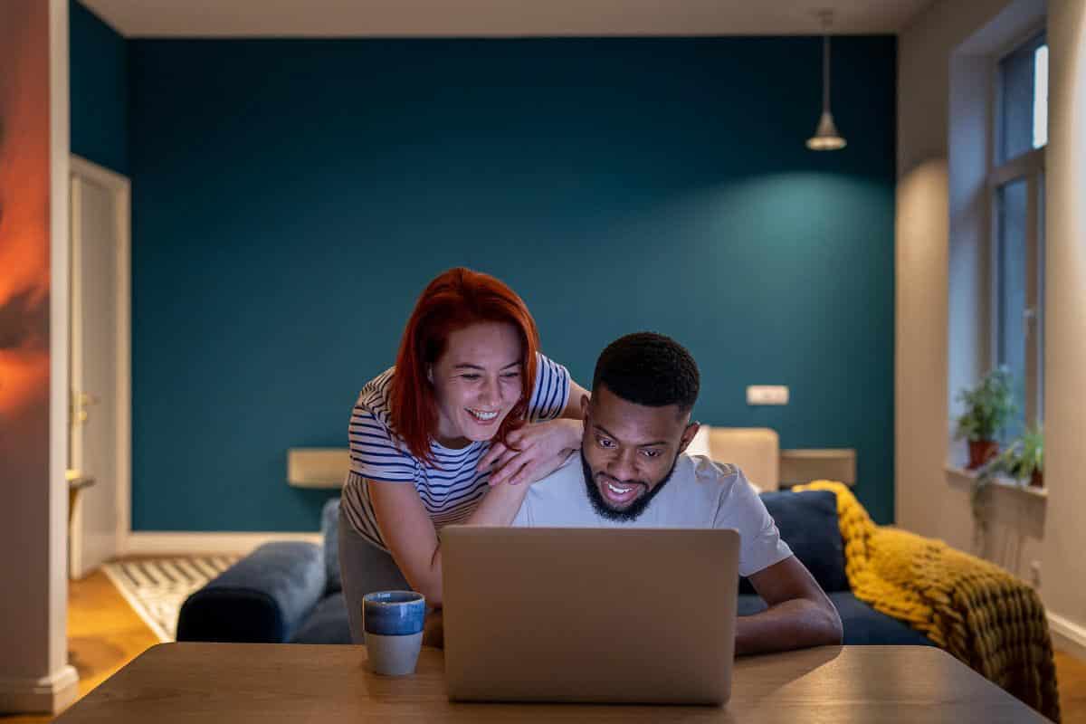 couple using computer together.