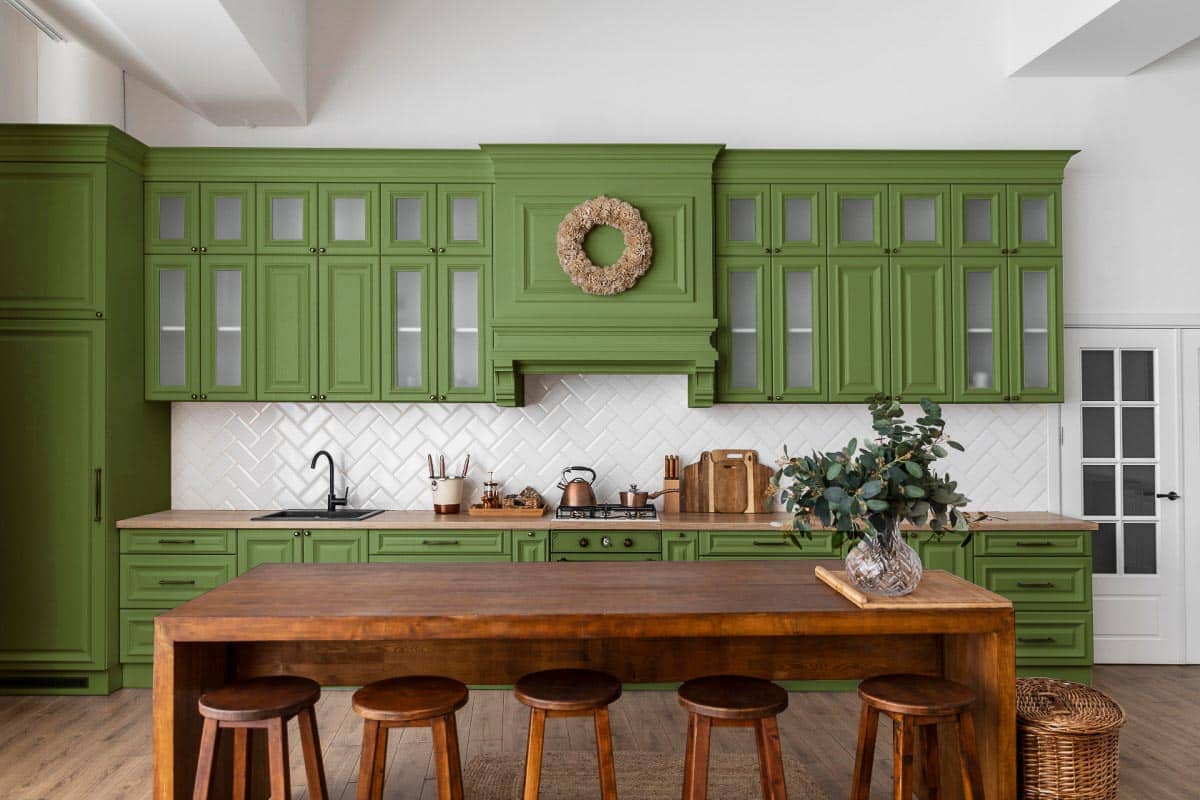 green kitchen cabinets. Shutterstock_2272865341.