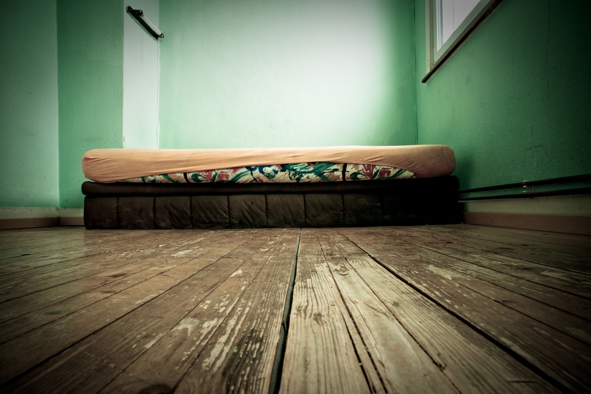 mattress on the floor.