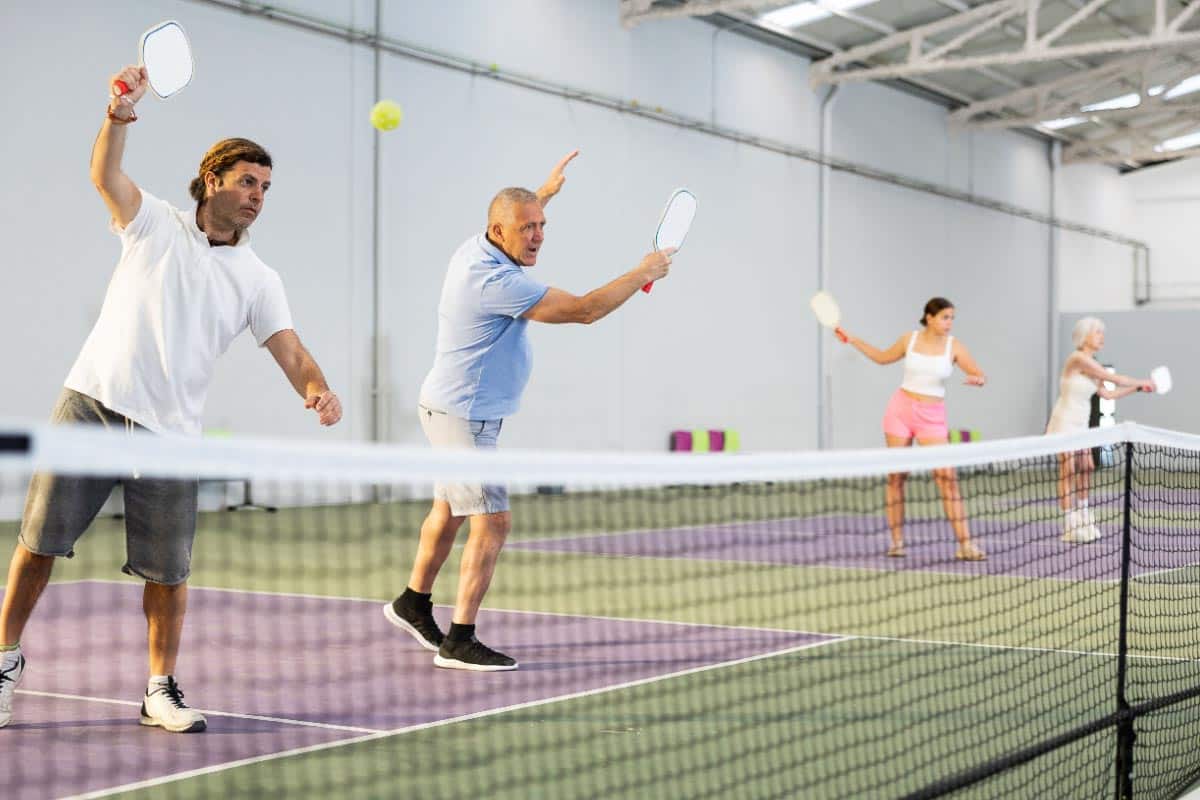 people playing pickleball. Shutterstock_2297061587.