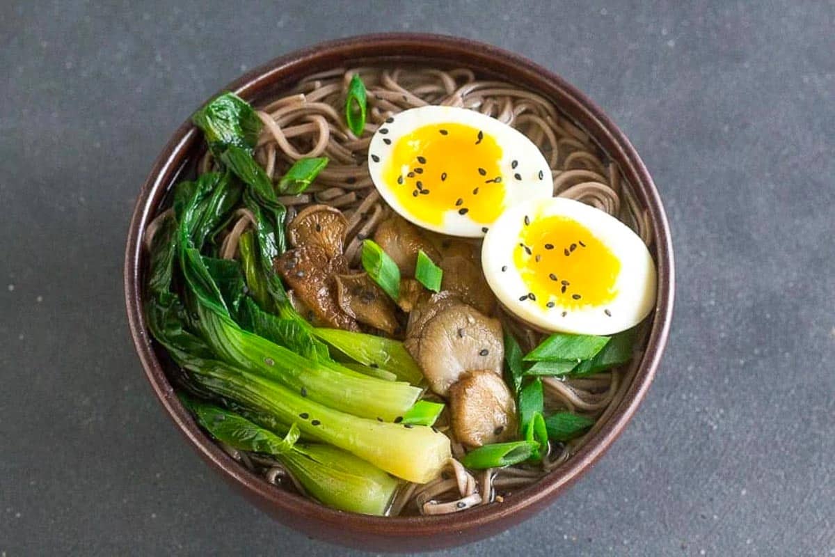 Low-FODMAP-Soba-Miso-Soup-with-Bok-Choy-and-Jammy-Eggs-in-brown-ceramic-bowl.