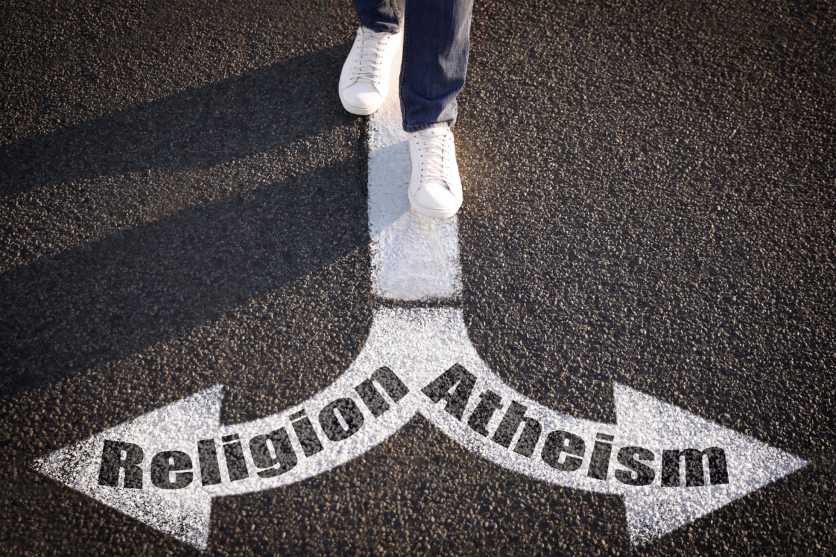 religion and atheism sign