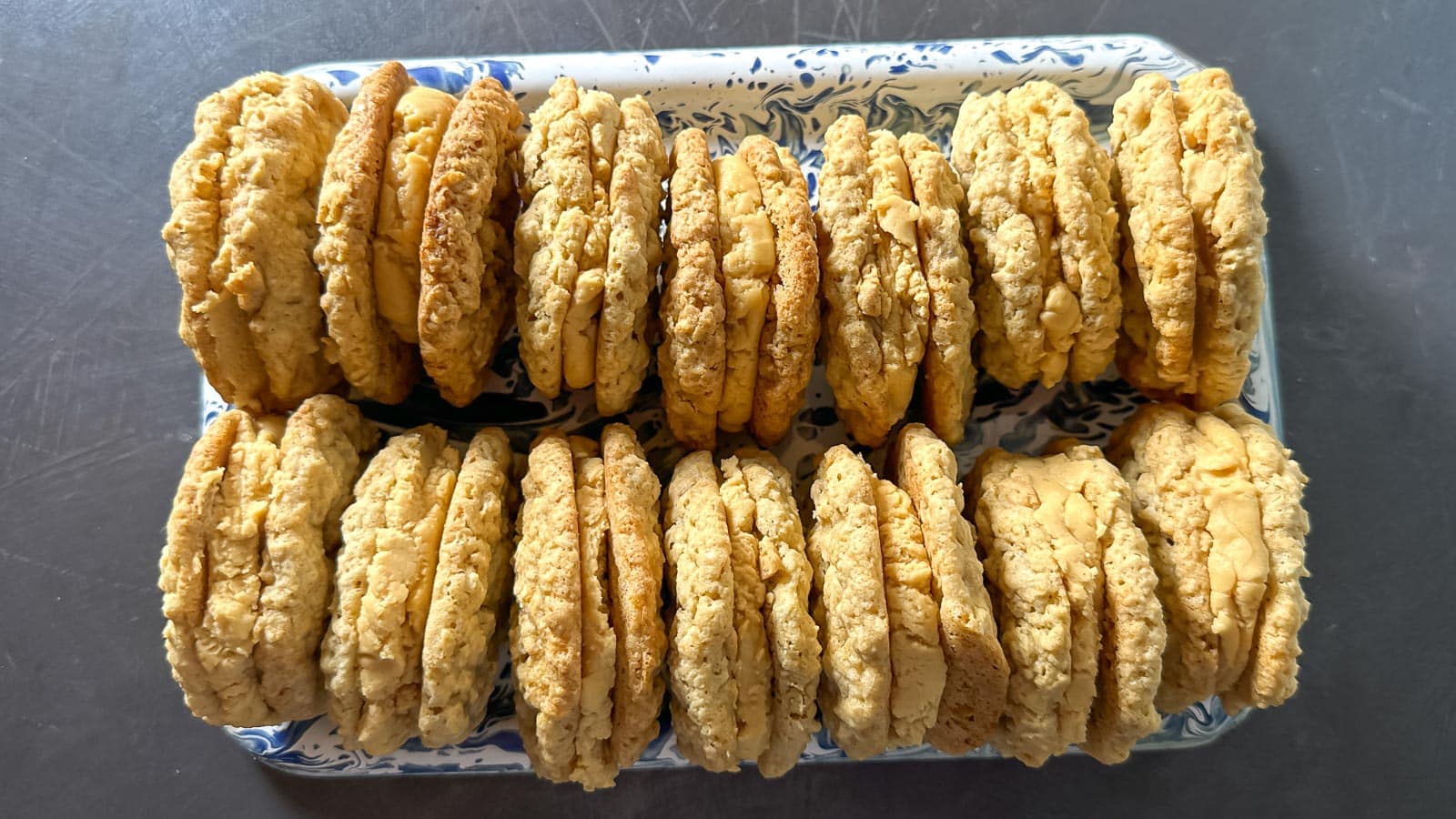 Low FODMAP Girl Scout Do-Si-Do Copycat cookies Recipe lined up on a blue and white tray.