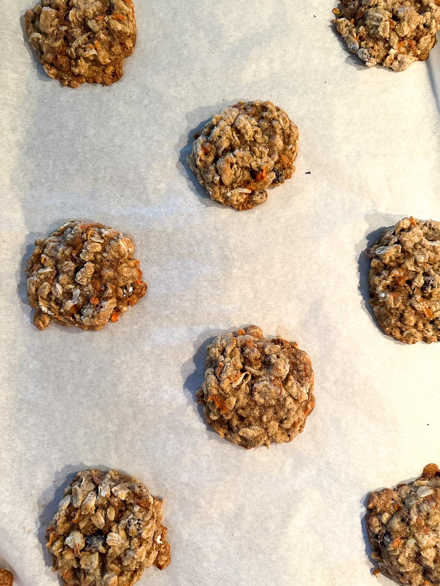 baked carrot cake oatmeal cookies on pan.