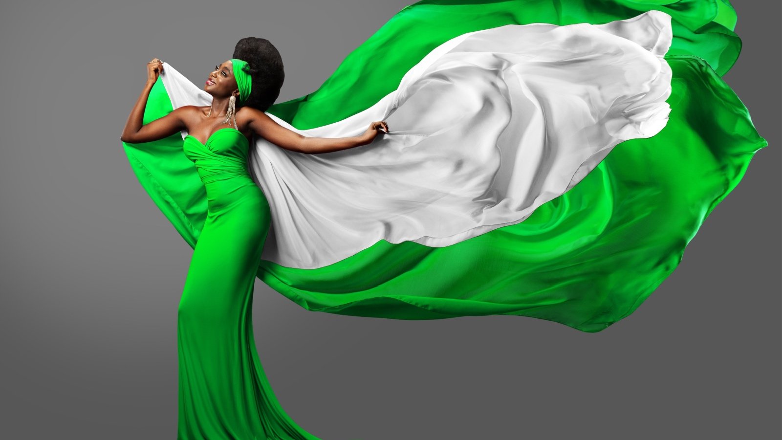 Woman with Nigerian flag.