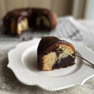 Low FODMAP Marble Bundt Cake slice on plate.
