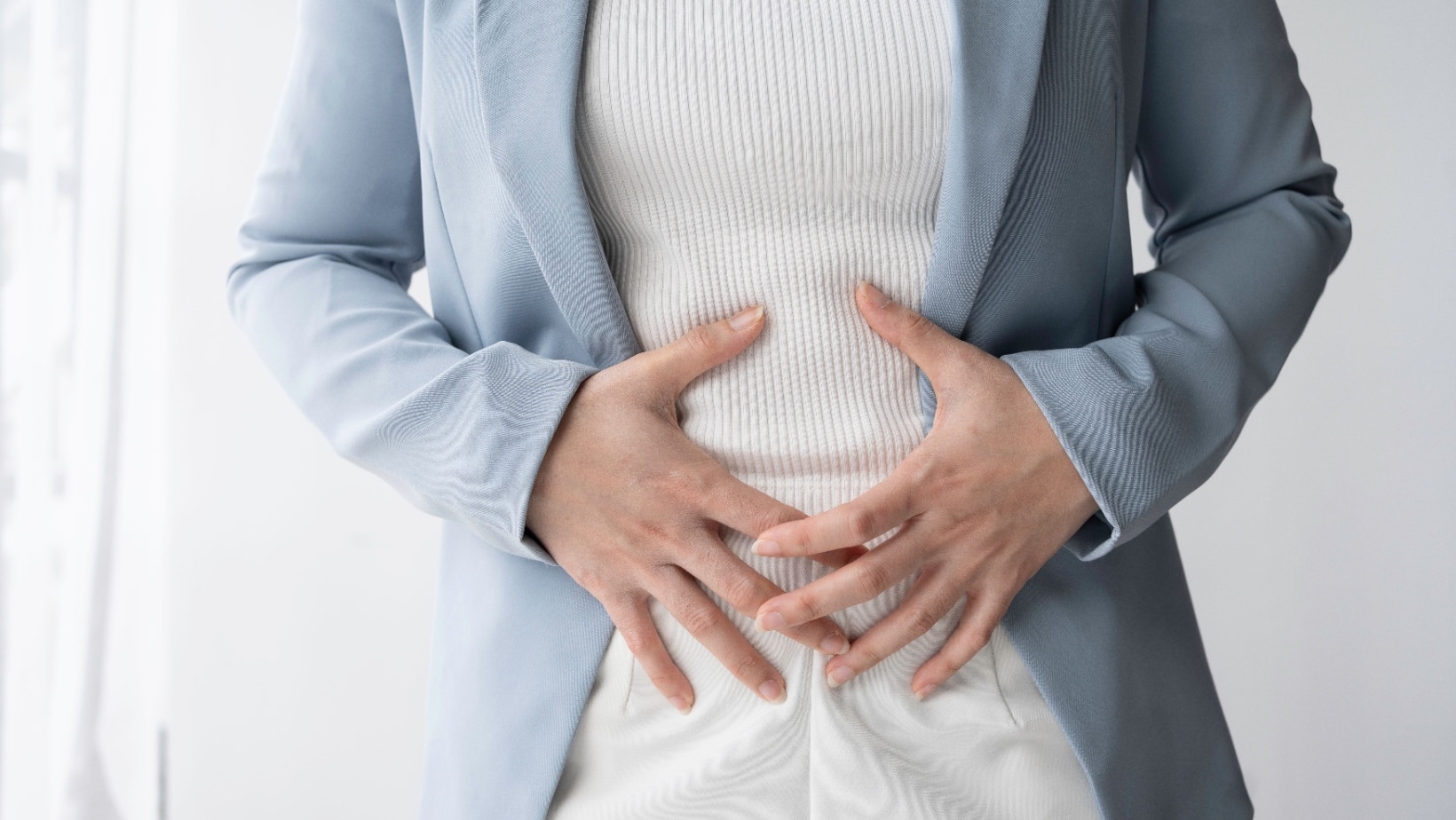 guy stomach ache. Premreuthai via Shutterstock.