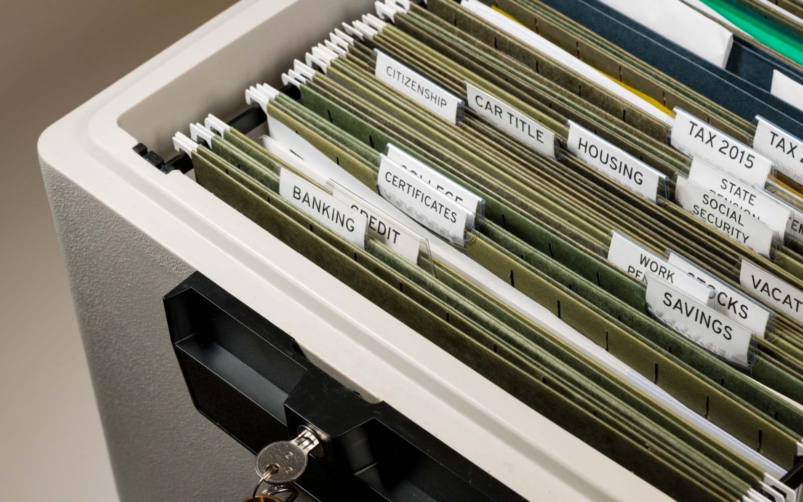 Close up of a well organized home filing system with tabs for each subject with focus on social security