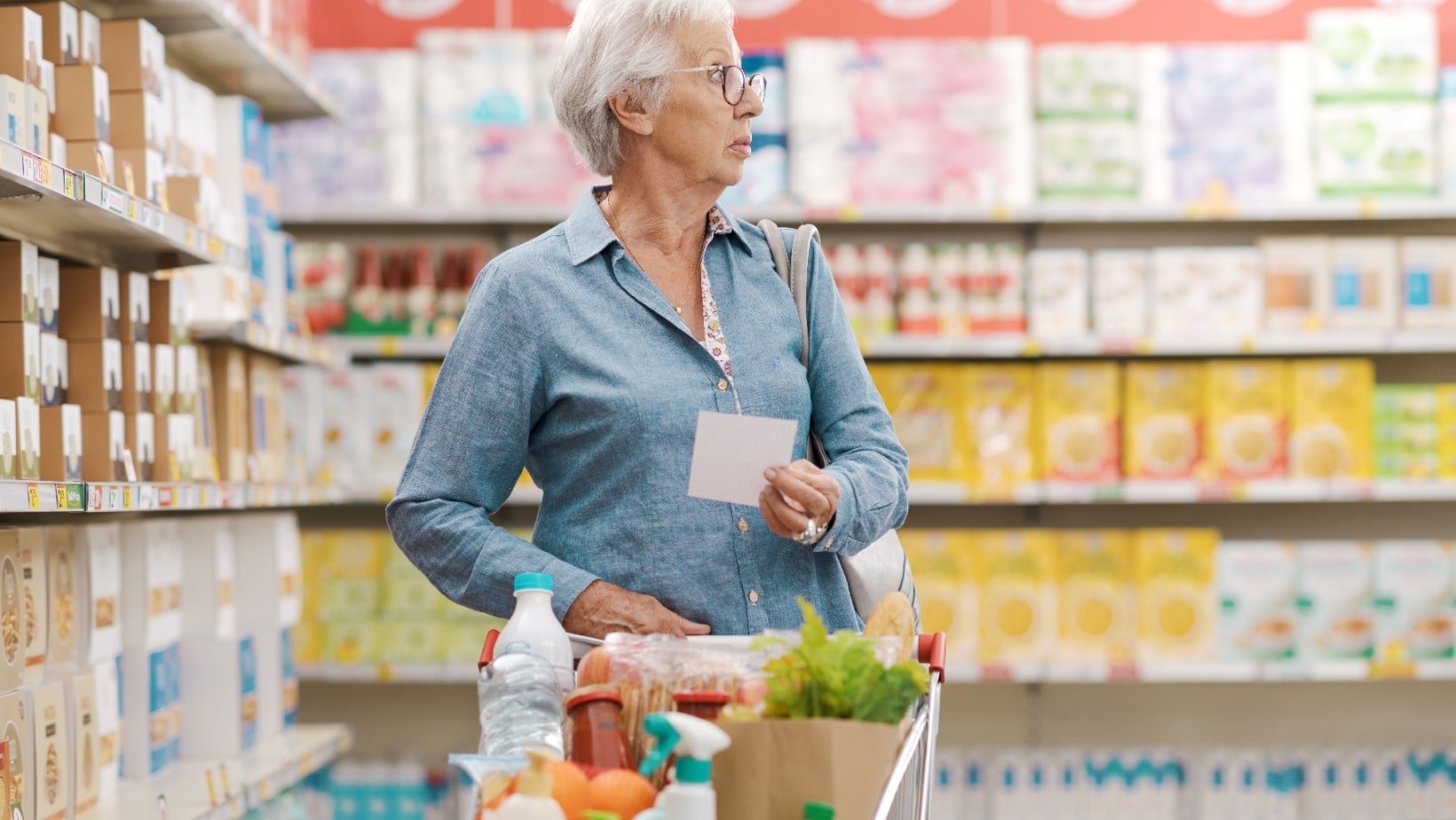 confused senior woman shopping. Supermarket.