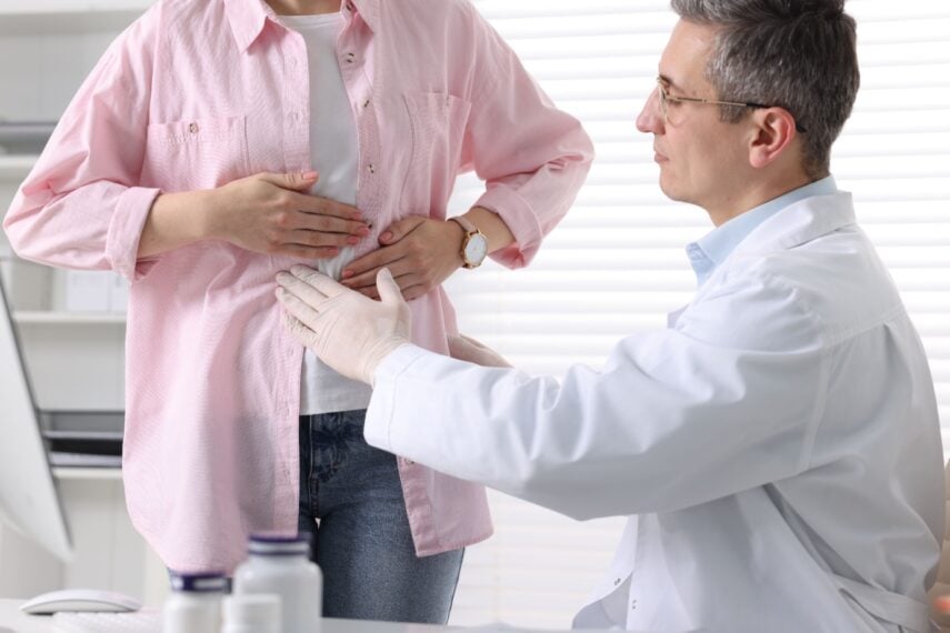 female patient with gastroenterologist.
