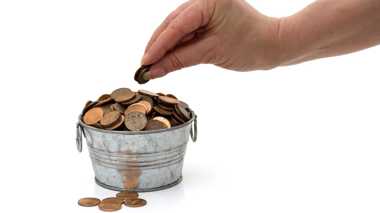 Pennies in a small bucket. karenr via 123rf