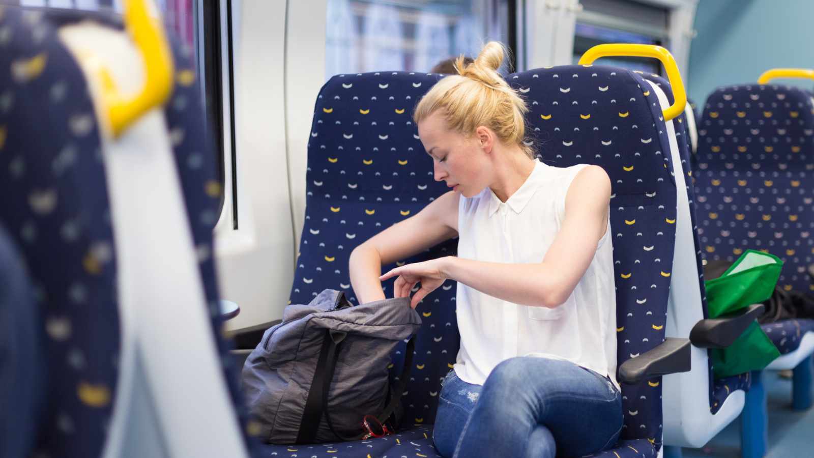Don’t claim an extra seat with your bag