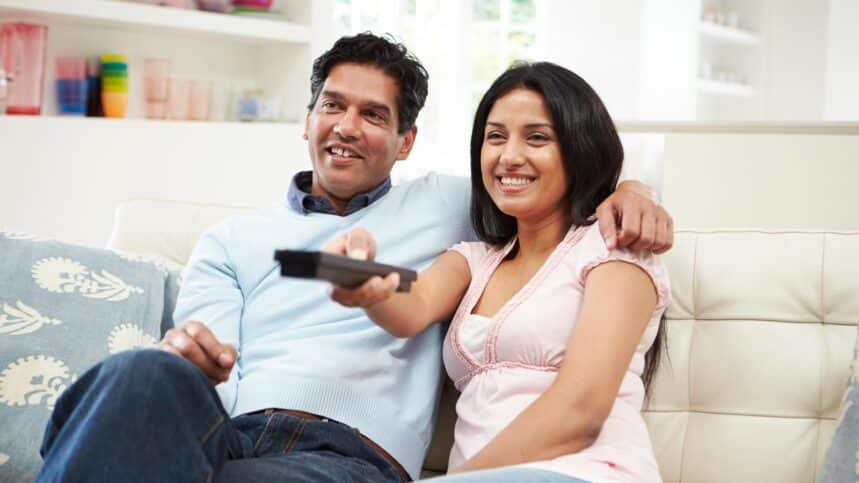 watching TV. stockbroker via 123rf