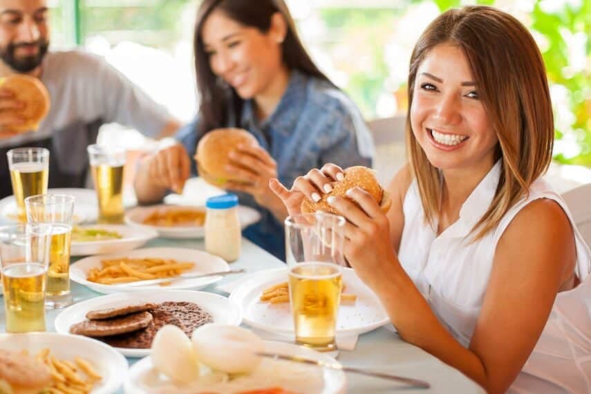 Friends enjoying food together. antoniodiaz via 123rf