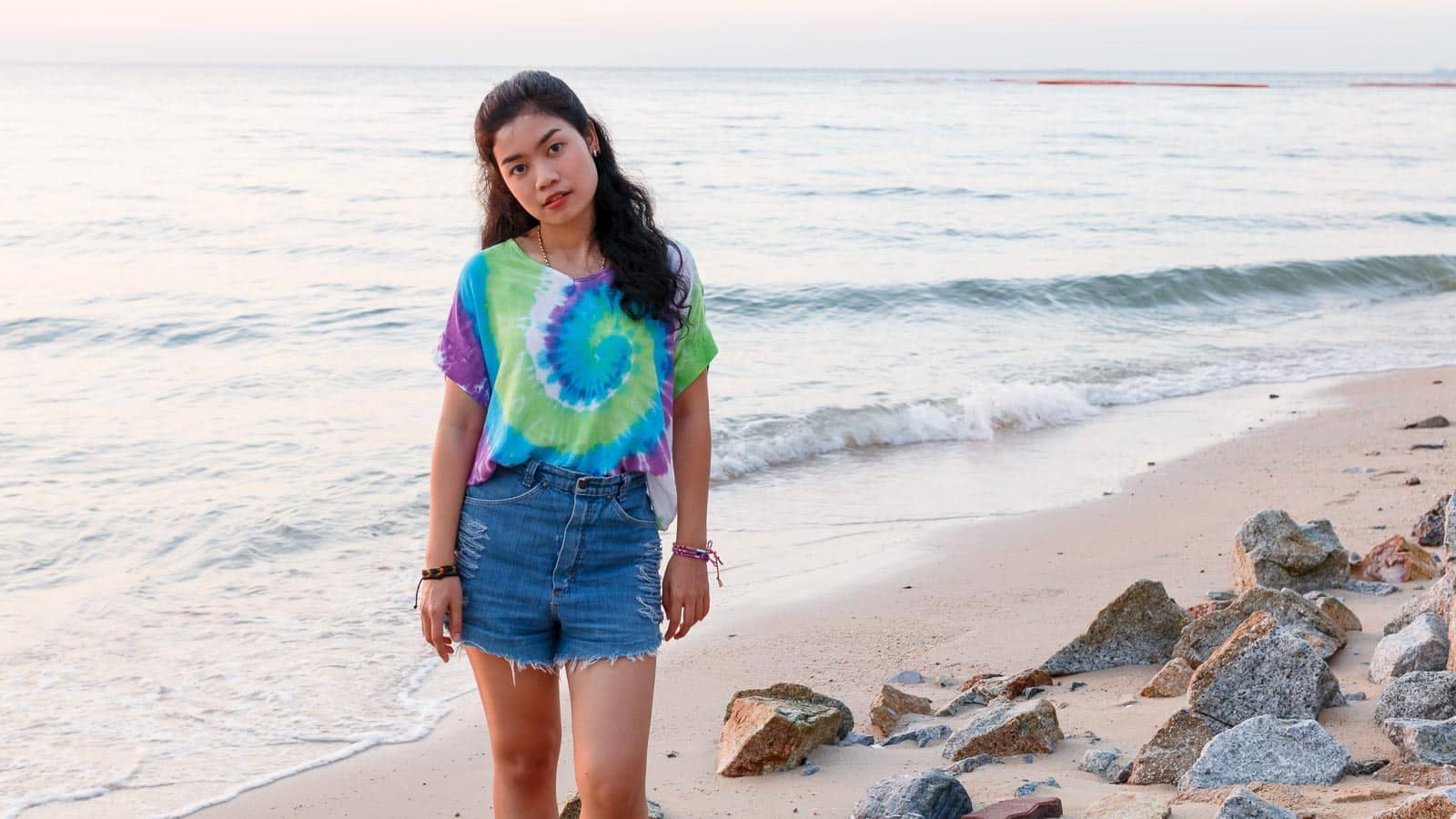 girl wearing tie dye shirt. karimpard via 123rf