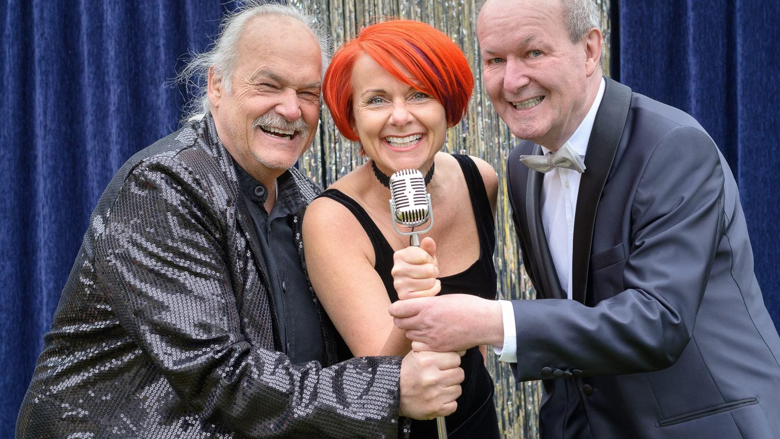 3 adults singing. mheim301165 via 123rf