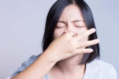 Holding nose. Smelly. Fart. Gas. chajamp via 123rf