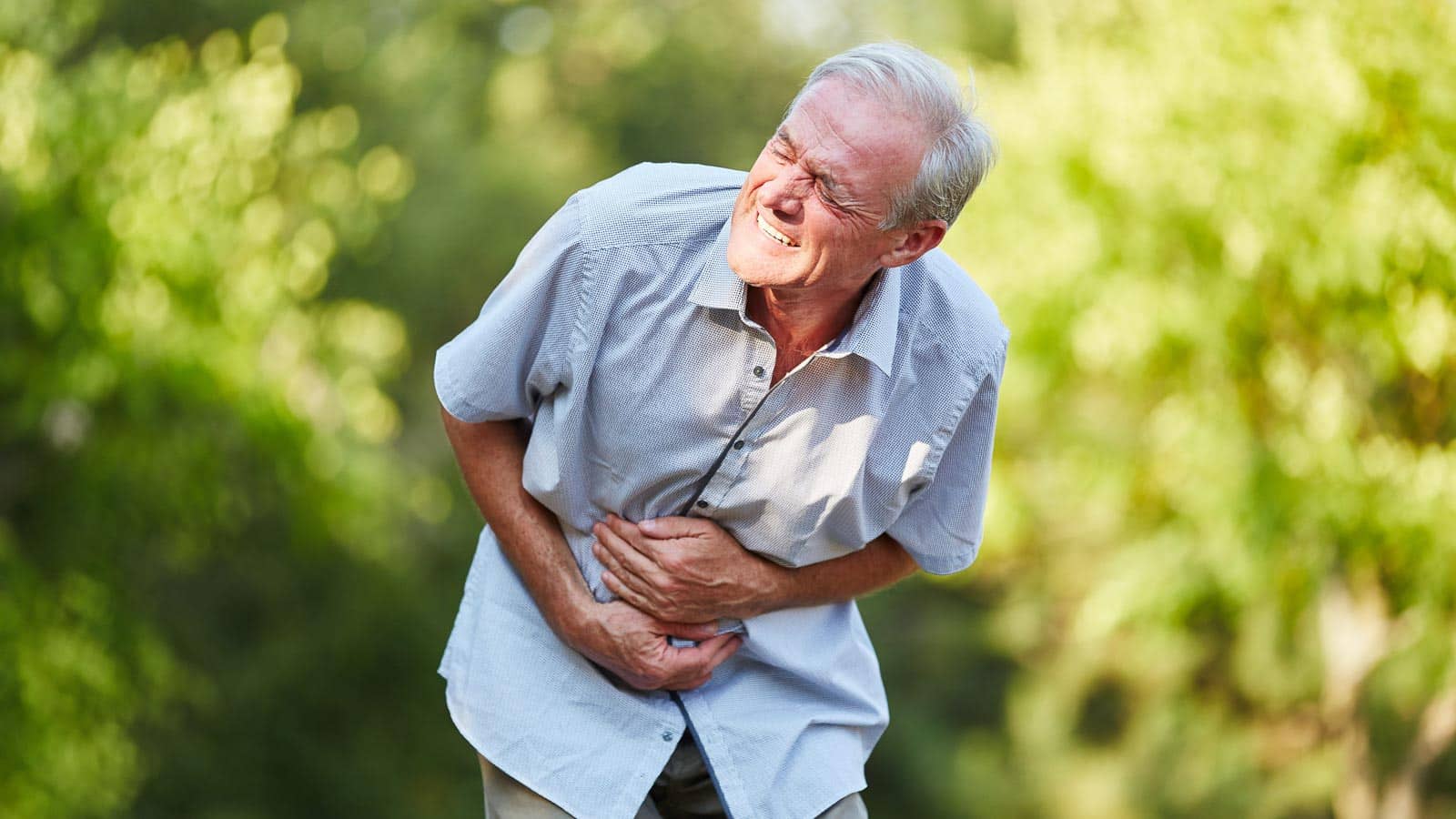 man with stomach pain senior. stylephotographs via 123rf
