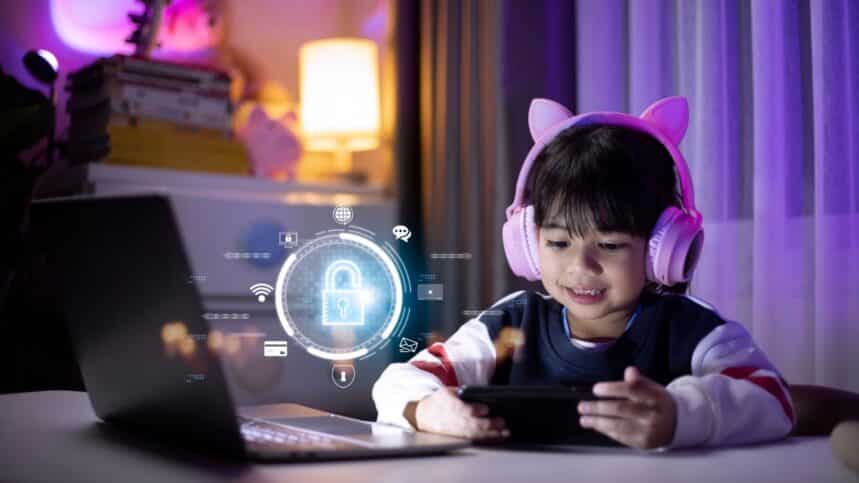 Little girl using smartphone at home