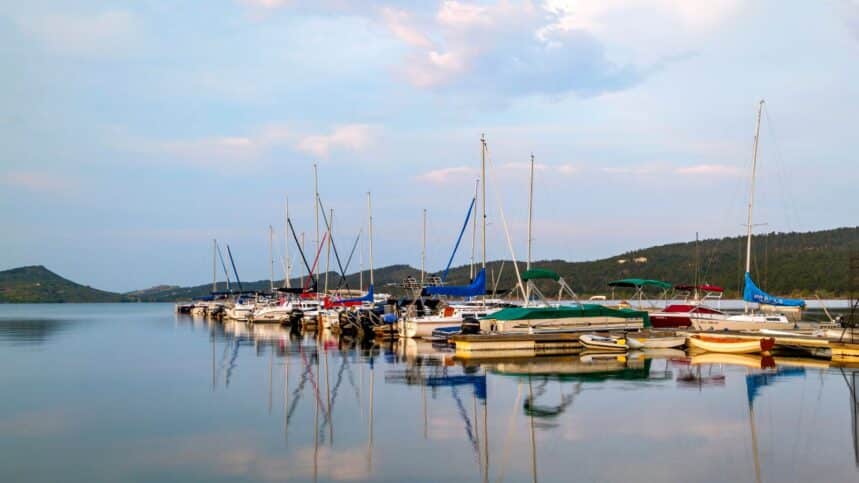 Colorful boats sit in the Carter Lake Marina