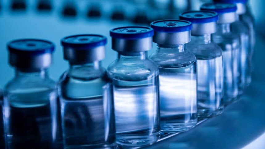 Group of Vaccine bottles. Medicine in ampoules. Glass vials for liquid samples in laboratory.