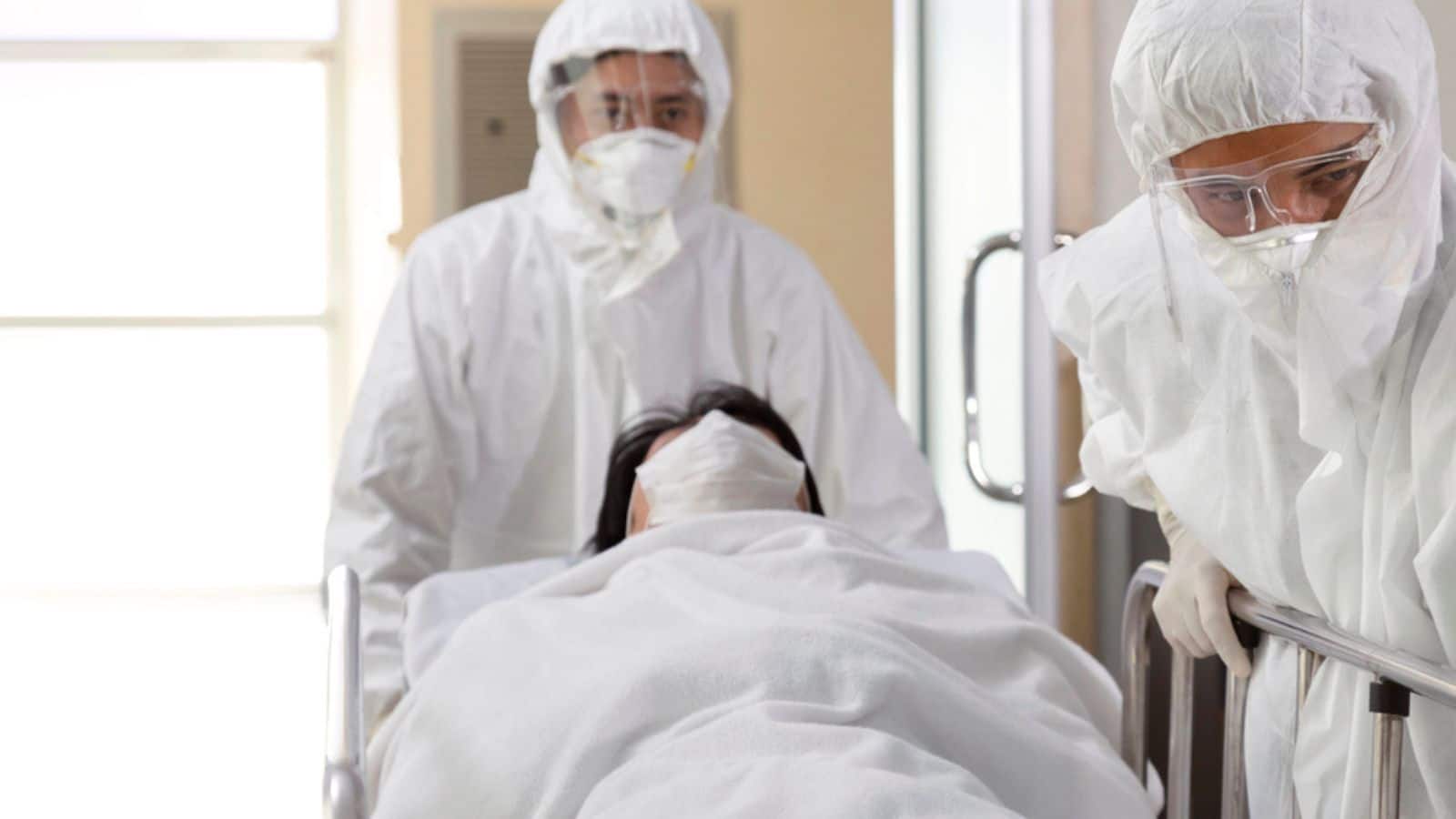 Ebola patient being cared for by medical officials