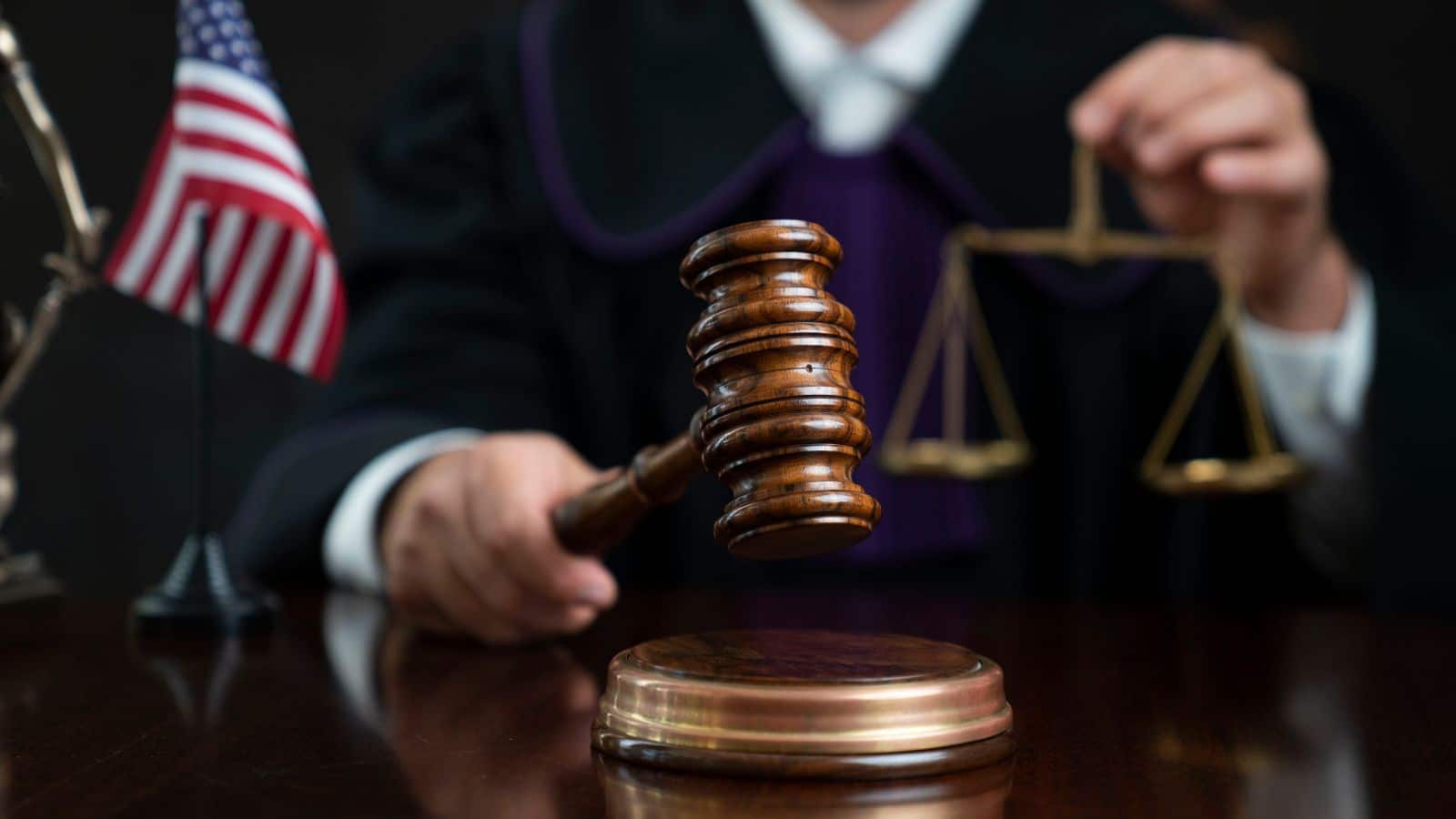 Judge with the wooden gavel in his hand. Law and justice theme