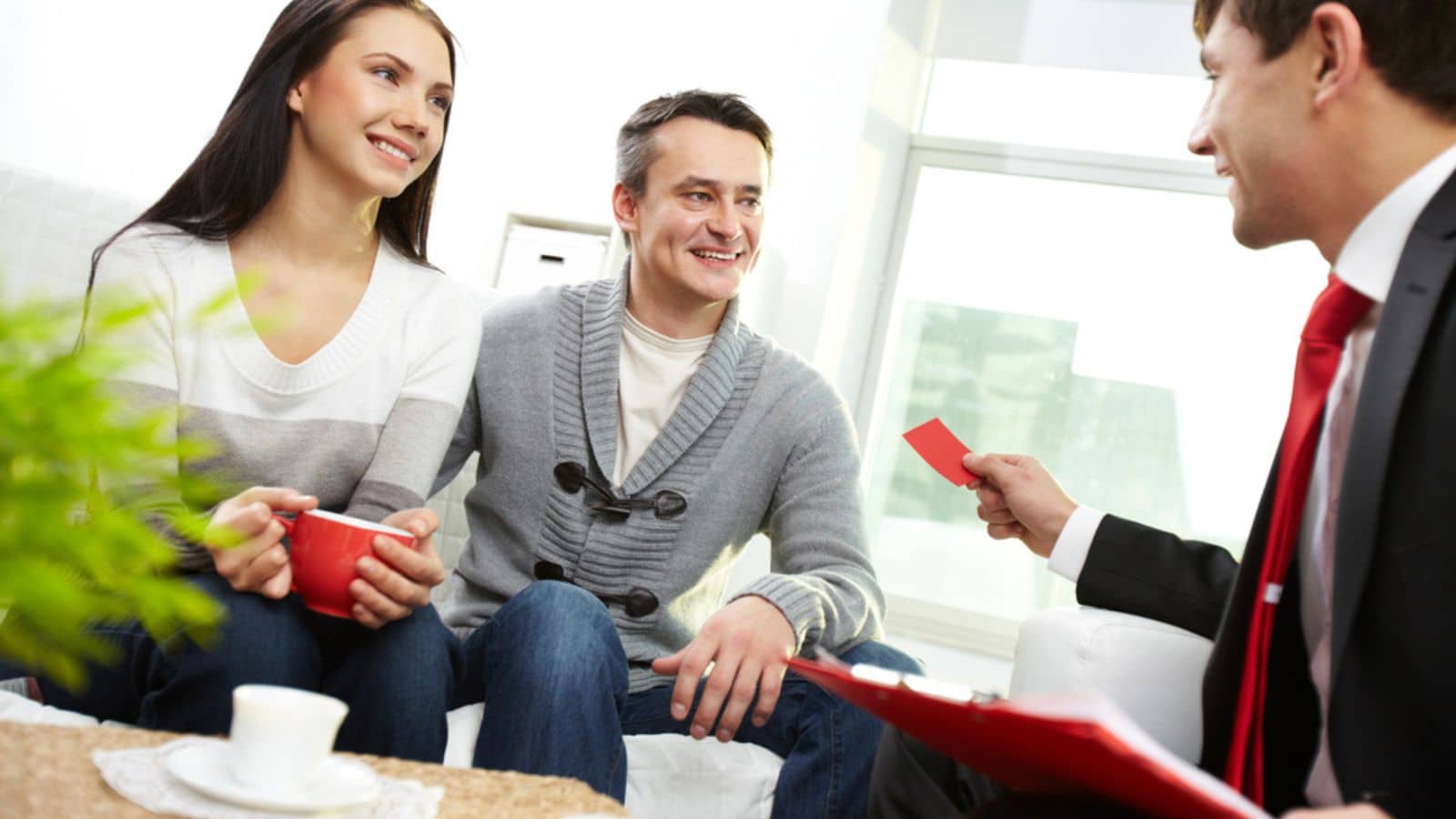 Man and woman having a meeting with a man