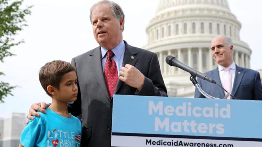 Doug Jones speaking at pro-Medicaid press conference.