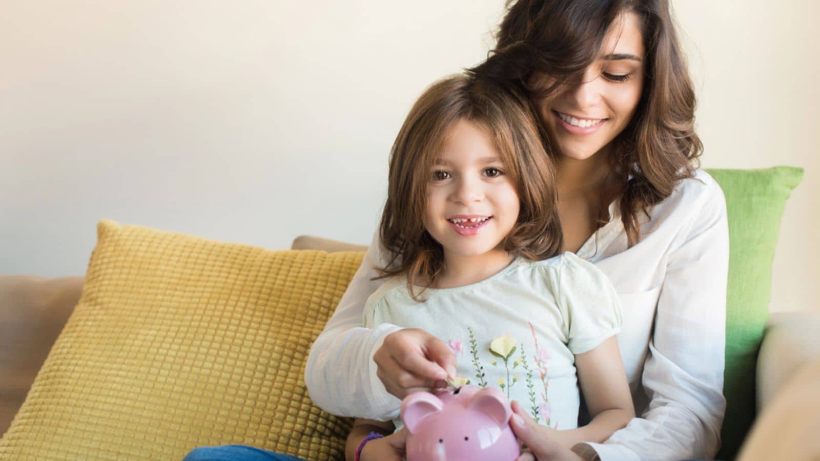 Mom and daughter saving money