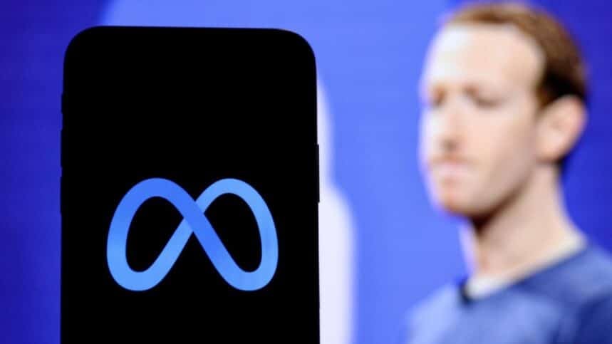 meta logo and blurred image of Zuckerberg