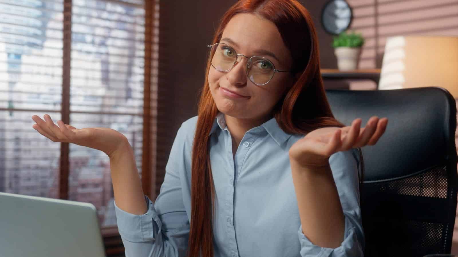 woman online laptop shrugging. I don't know. mayaporto via 123rf