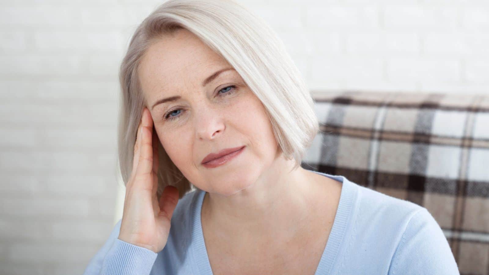 Sad woman deeply thinking