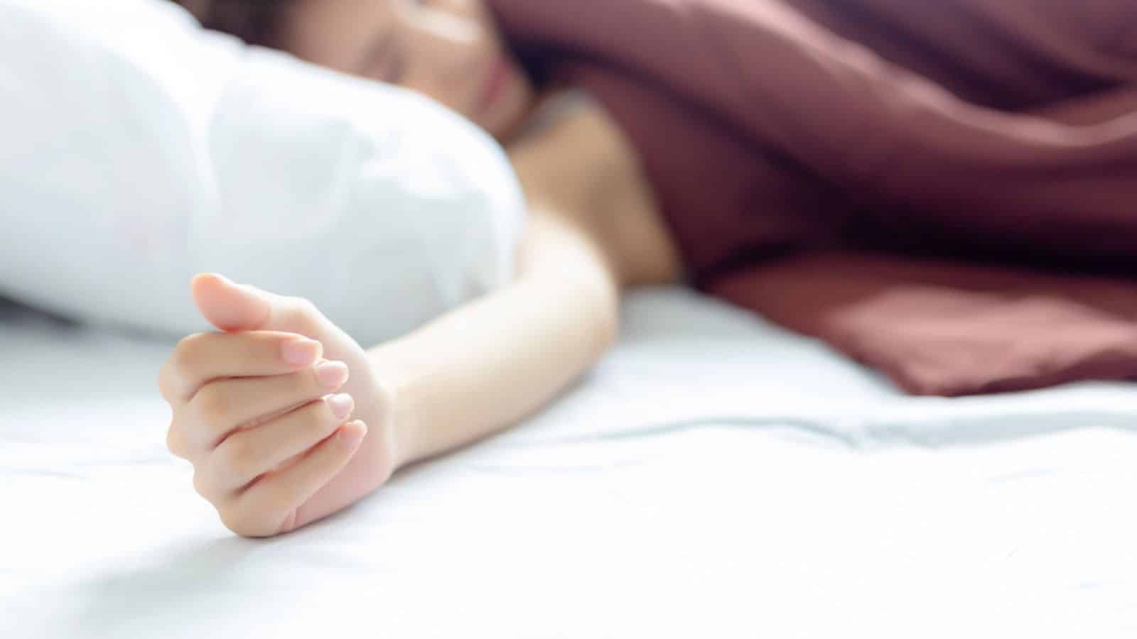 woman lying in bed
